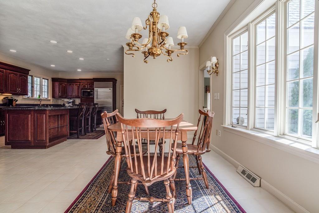 104 Fox Run Road Sudbury, MA 01776 - Photo 10 of 36 a view of a dining room with furniture window and wooden floor