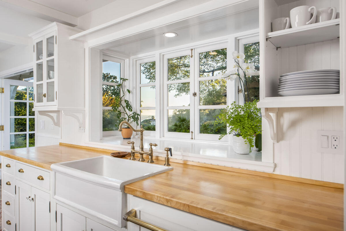 223 Rametto Road Santa Barbara, CA 93108 - Photo 17 of 35 a view of a kitchen with granite countertop a large window and a sink