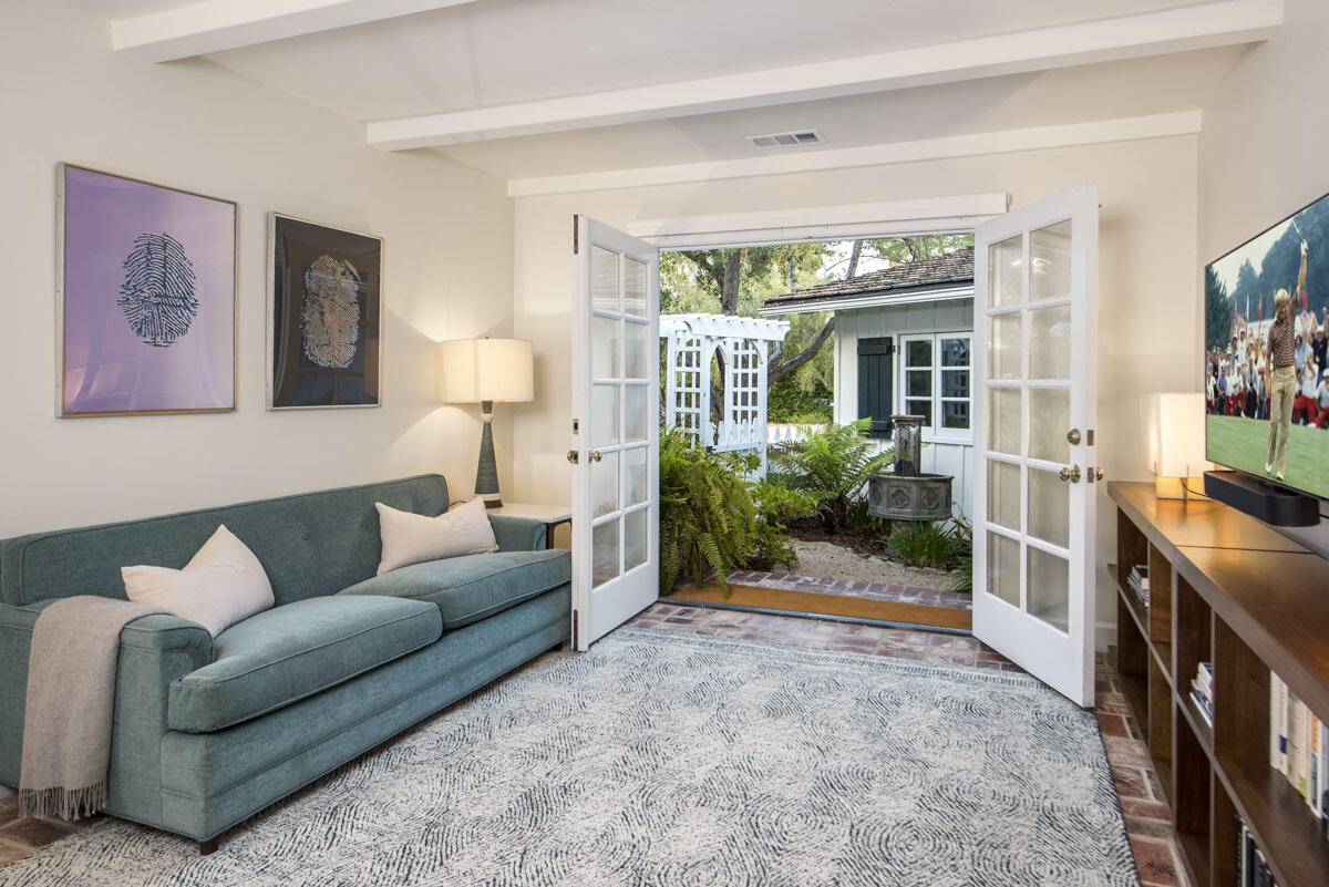 223 Rametto Road Santa Barbara, CA 93108 - Photo 28 of 35 a living room with furniture and a flat screen tv