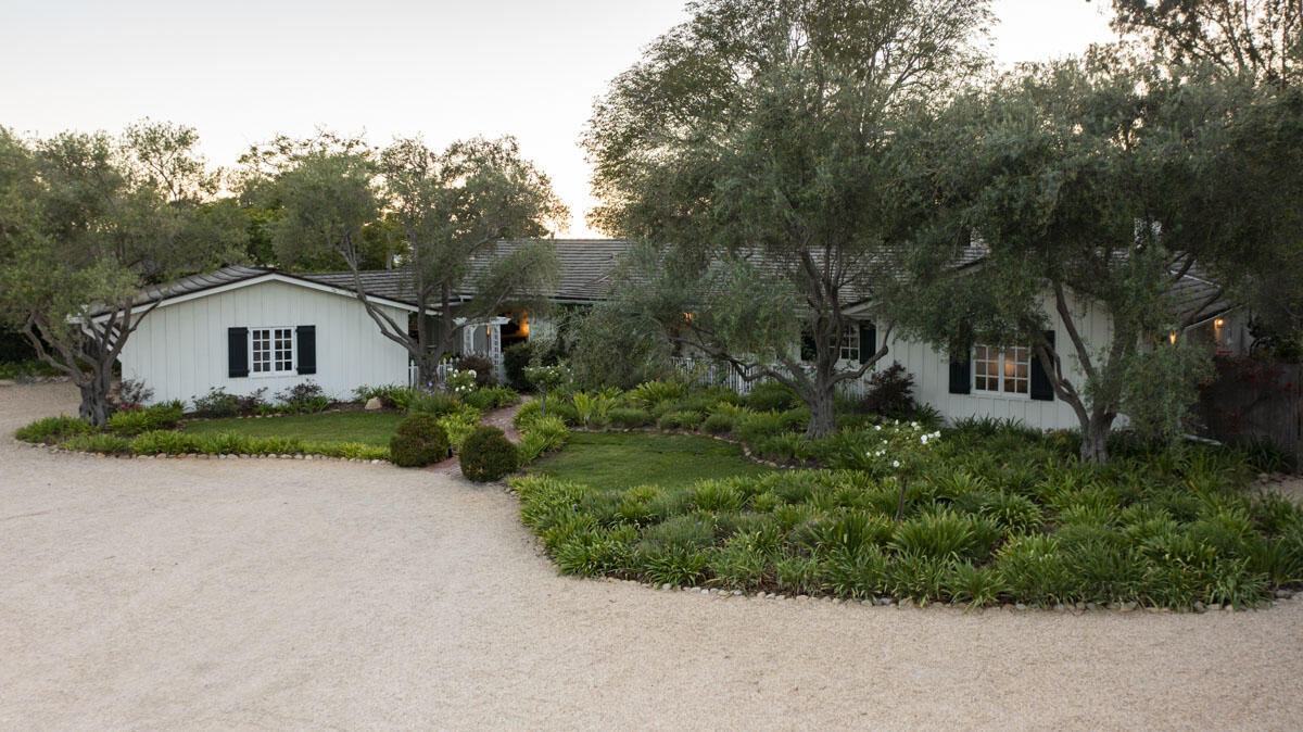 223 Rametto Road Santa Barbara, CA 93108 - Photo 35 of 35 a view of a house with a small yard and large tree