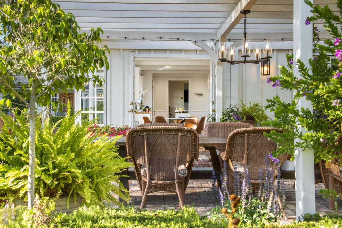 223 Rametto Road Santa Barbara, CA 93108 - Photo 9 of 35 a view of a patio with table and chairs and potted plants