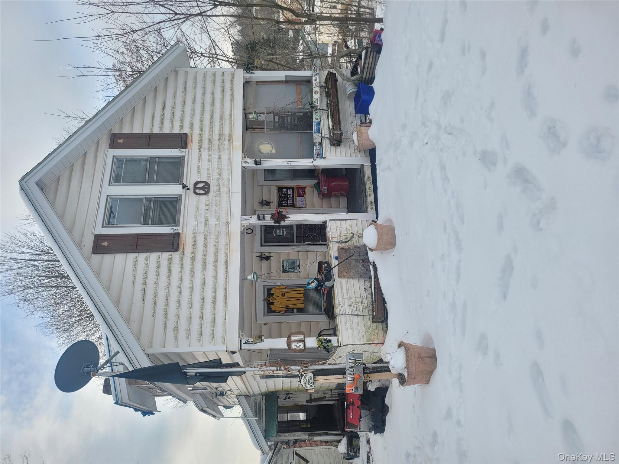 31 South Liberty Road Liberty, NY 12754 - Photo 1 of 8 View of front of property featuring a porch