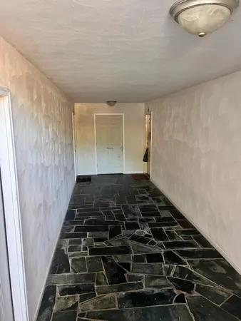 a view of a room with an empty space