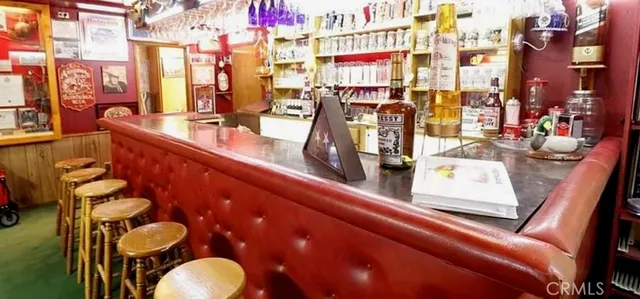 view of living room with furniture and floor to ceiling window