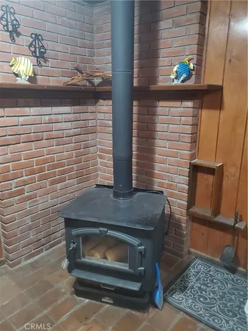 a stove top oven sitting inside of a kitchen