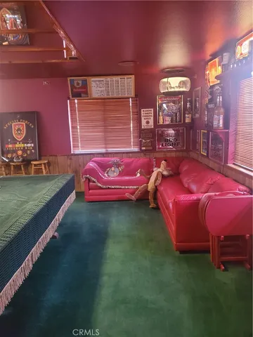 a bed room with a bed and a couch