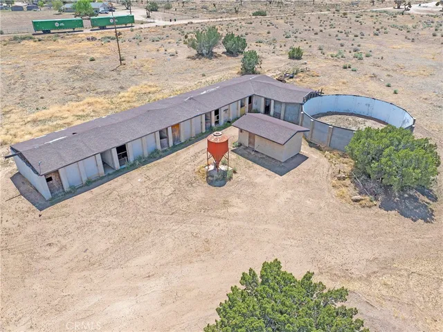 a view of swimming pool with seating space