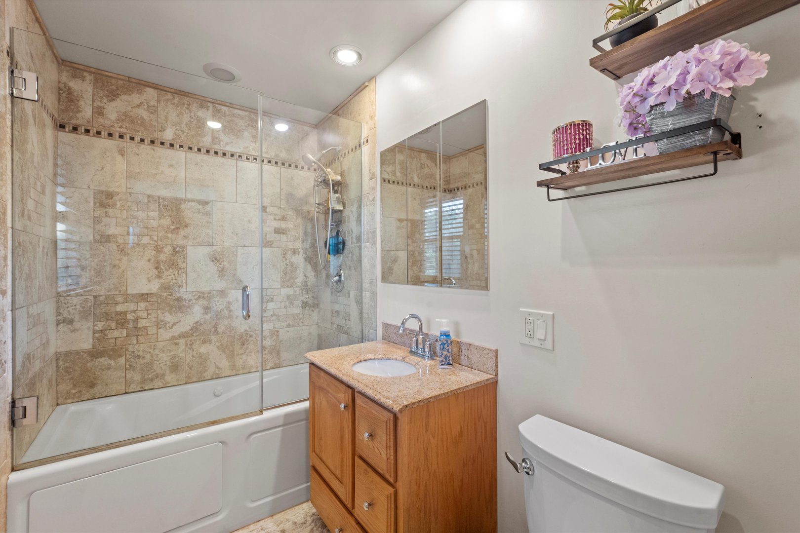 3644 Poplar Road Flossmoor, IL 60422 - Photo 13 of 22 a bathroom with a sink toilet vanity and shower