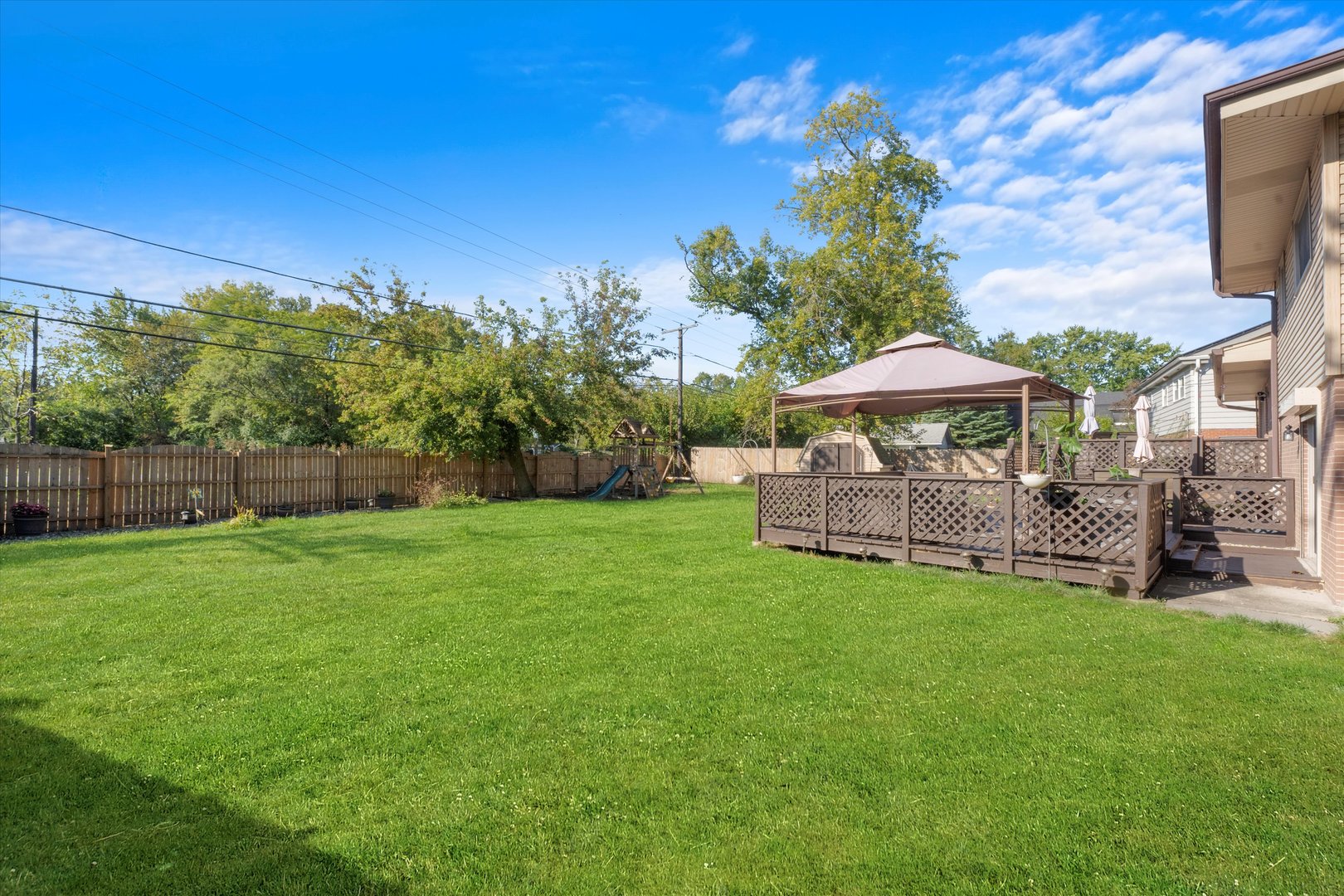 3644 Poplar Road Flossmoor, IL 60422 - Photo 20 of 22 a view of a house with a yard porch and sitting area