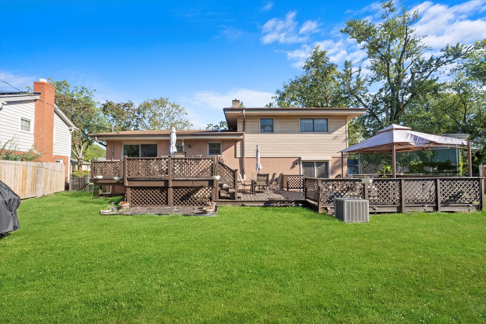 3644 Poplar Road Flossmoor, IL 60422 - Photo 22 of 22 a view of a house with a yard and sitting area