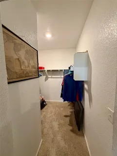 a view of a house with backyard porch and sitting area