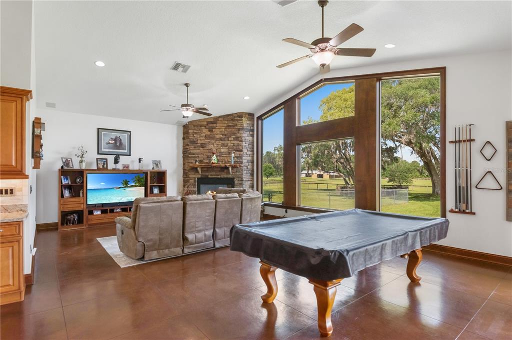6140 Northwest 145th Avenue Road Morriston, FL 32668 - Photo 13 of 63 a view of a livingroom with furniture and a window