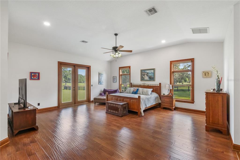 6140 Northwest 145th Avenue Road Morriston, FL 32668 - Photo 19 of 63 a living room with furniture and wooden floor