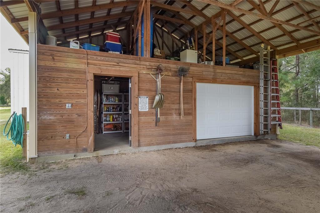 6140 Northwest 145th Avenue Road Morriston, FL 32668 - Photo 39 of 63 a view of a car garage of the house