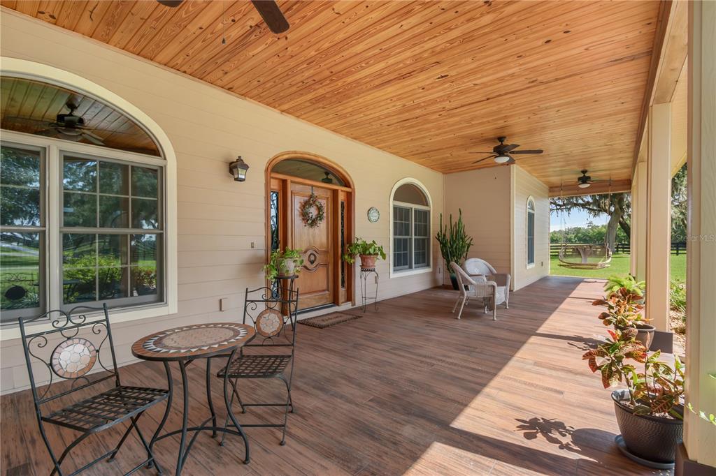 6140 Northwest 145th Avenue Road Morriston, FL 32668 - Photo 7 of 63 a living room with furniture and a table