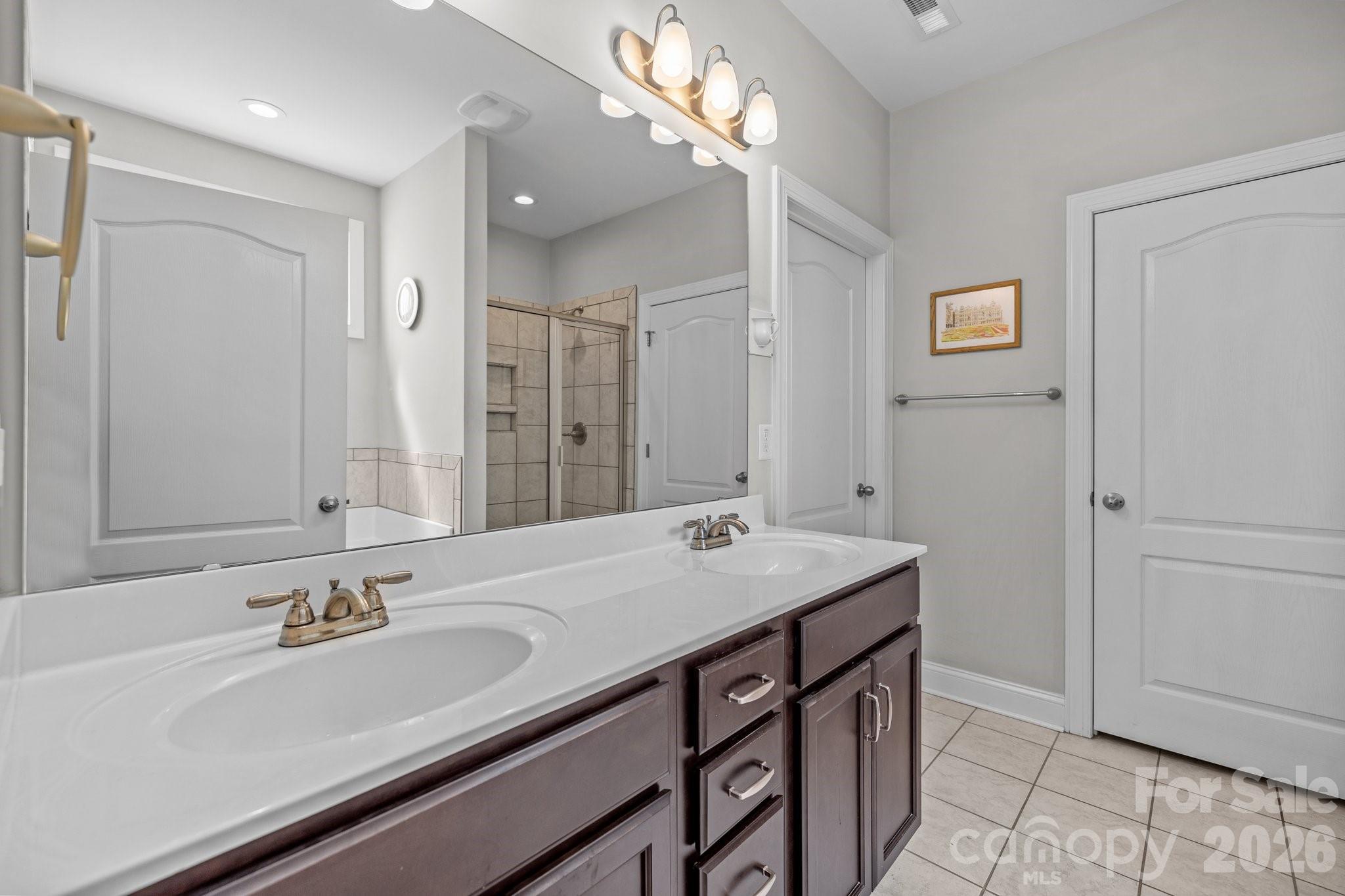 4697 Rinaldo Road York, SC 29745 - Photo 15 of 37 a bathroom with a sink and a mirror