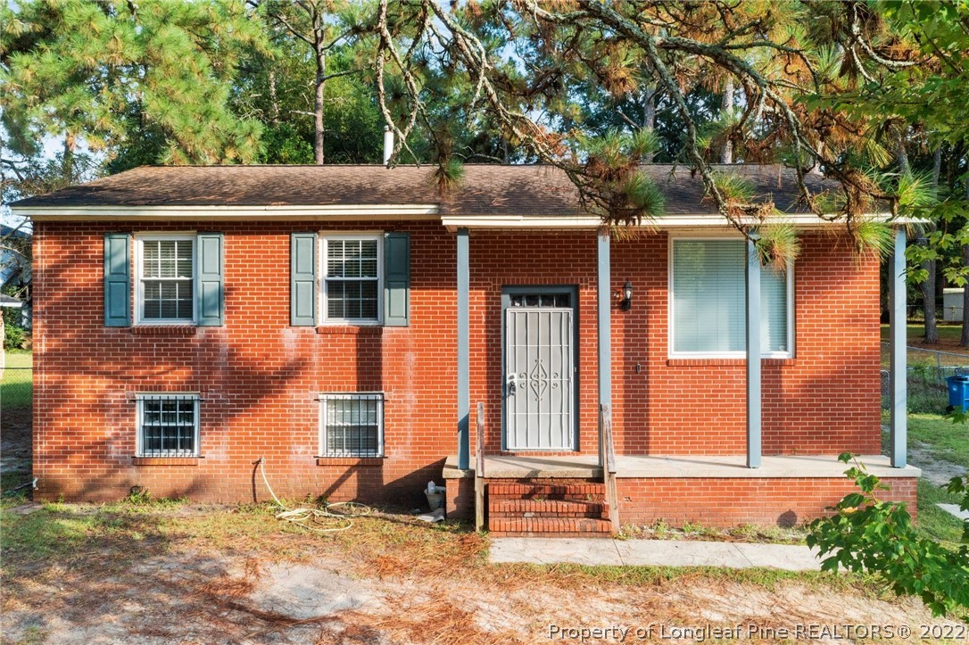 4311 Coventry Road Fayetteville, NC 28304 - Photo 1 of 22 front view of a house with a yard