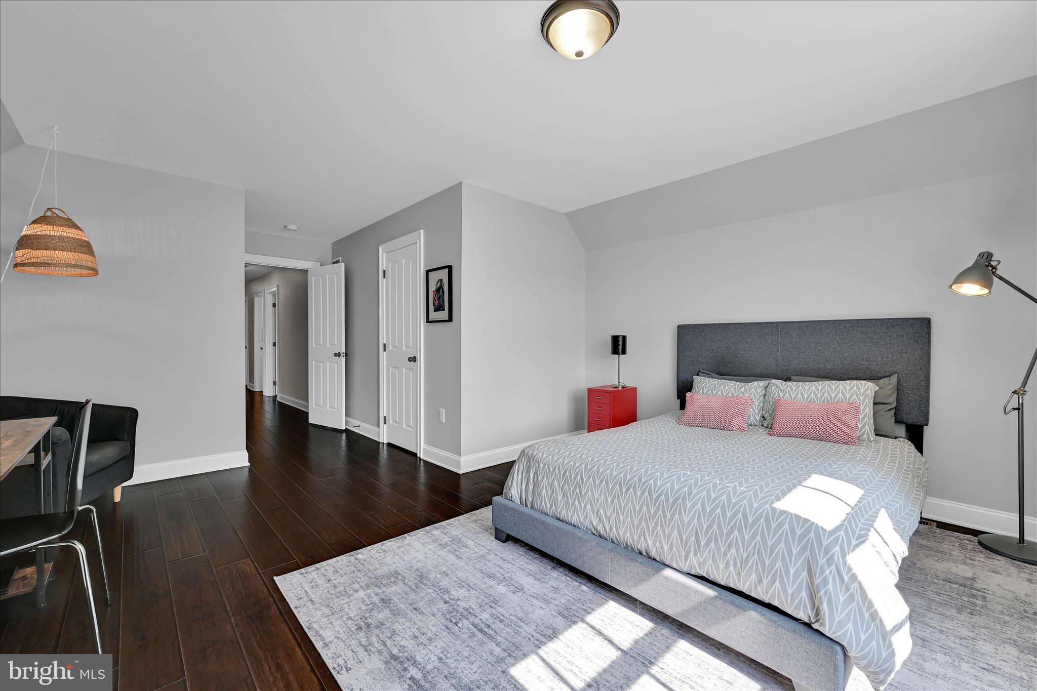 678 Integrity Drive Lititz, PA 17543 - Photo 30 of 51 a bedroom with a bed and wooden floor