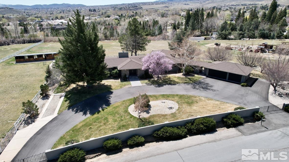 1940 View Reno, NV 89511 - Photo 2 of 38 a view of a house with a yard and garden