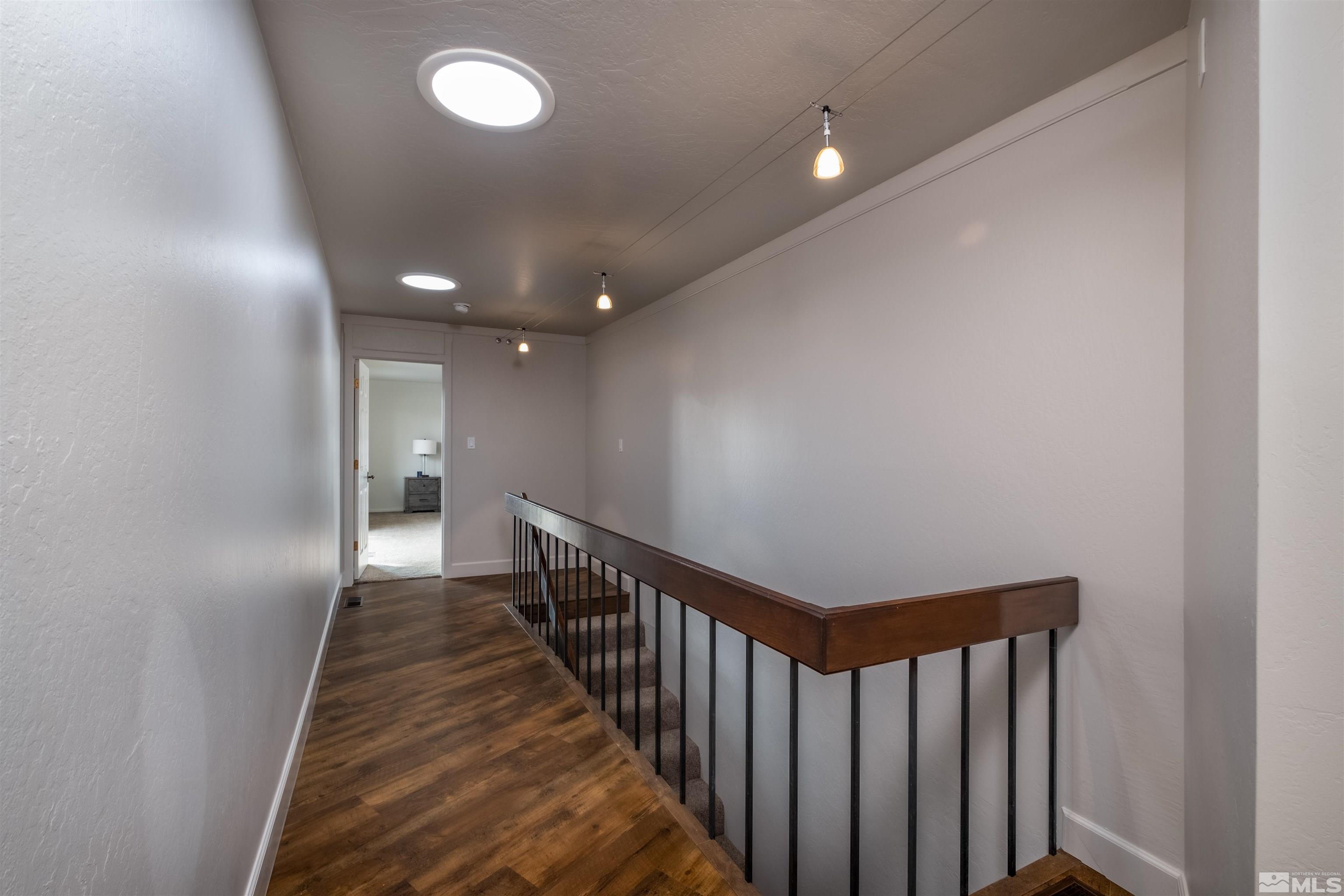 1940 View Reno, NV 89511 - Photo 25 of 38 a view of a hallway with wooden floor