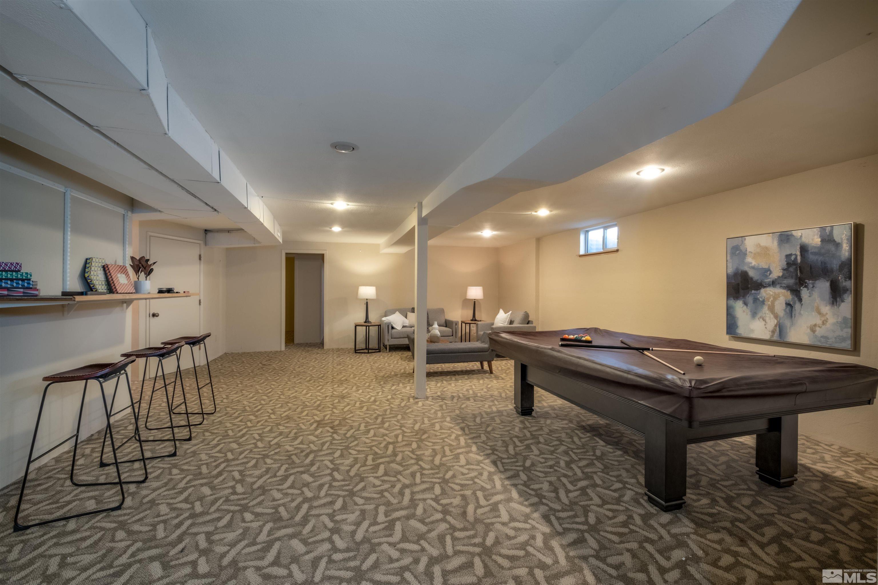 1940 View Reno, NV 89511 - Photo 26 of 38 a living room with furniture a rug and white walls