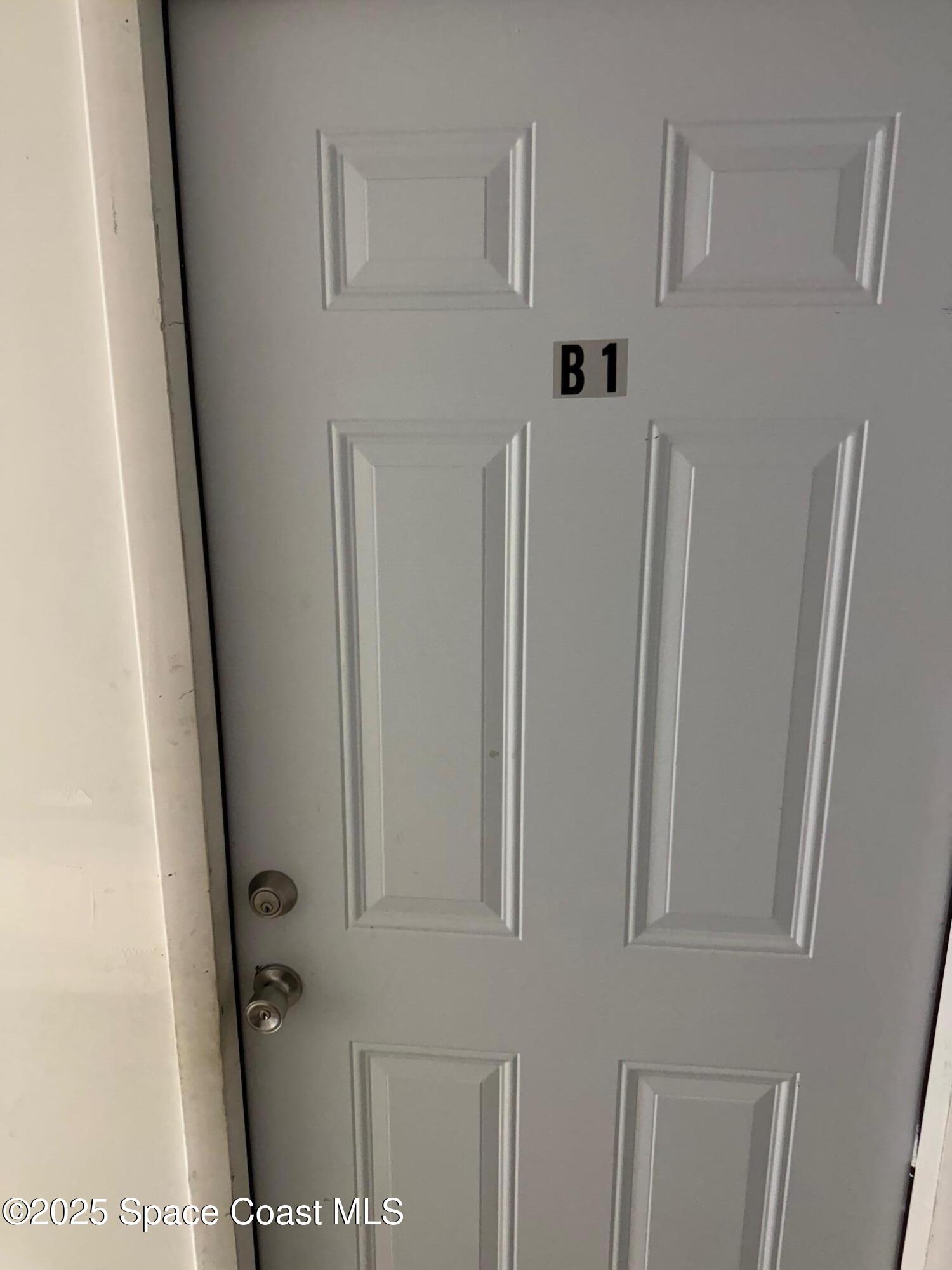 808 Forrest Avenue Cocoa, FL 32922 - Photo 2 of 11 a view of a hallway with refrigerator