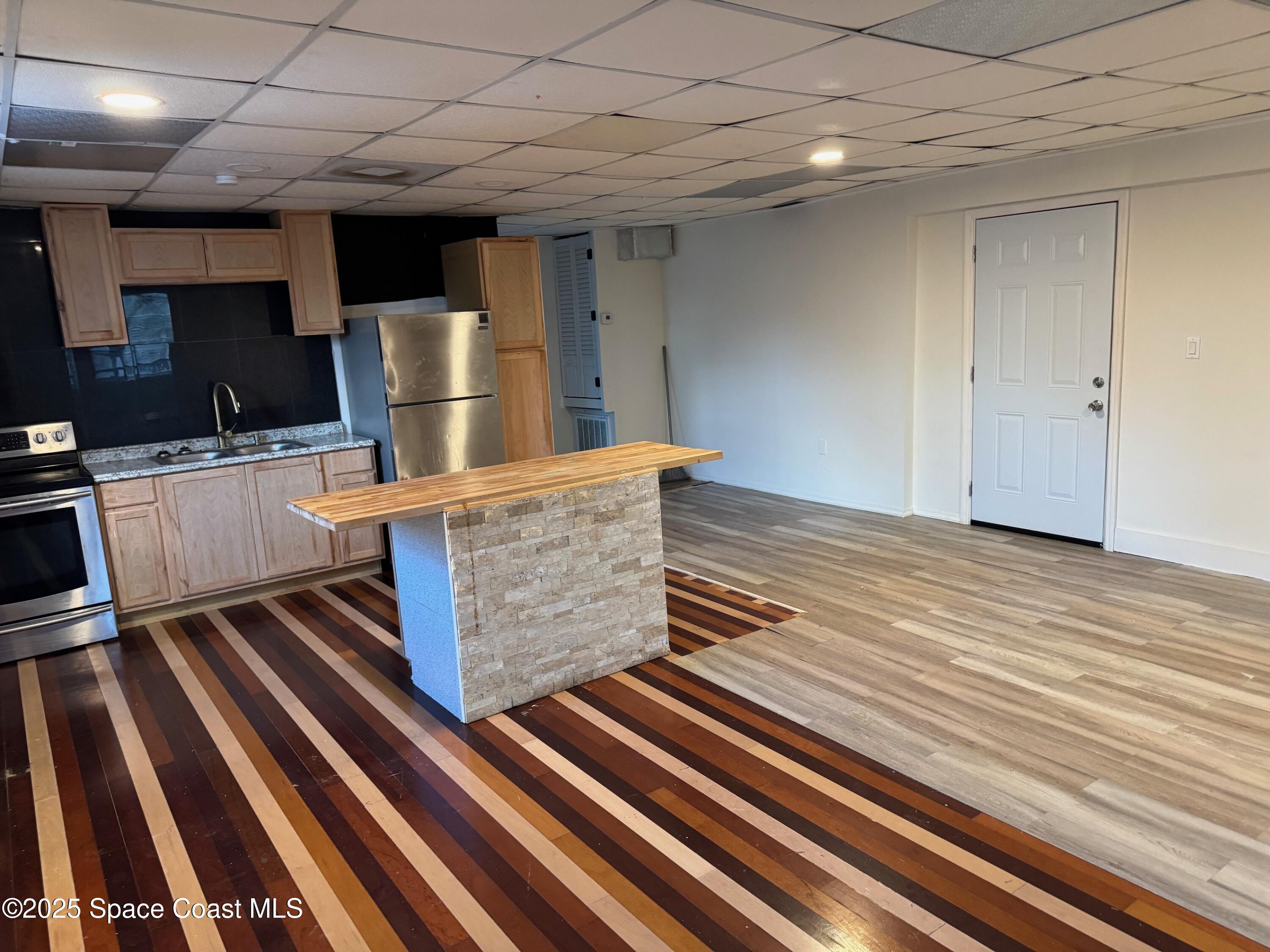 808 Forrest Avenue Cocoa, FL 32922 - Photo 4 of 11 a kitchen with lots of counter top space and appliances