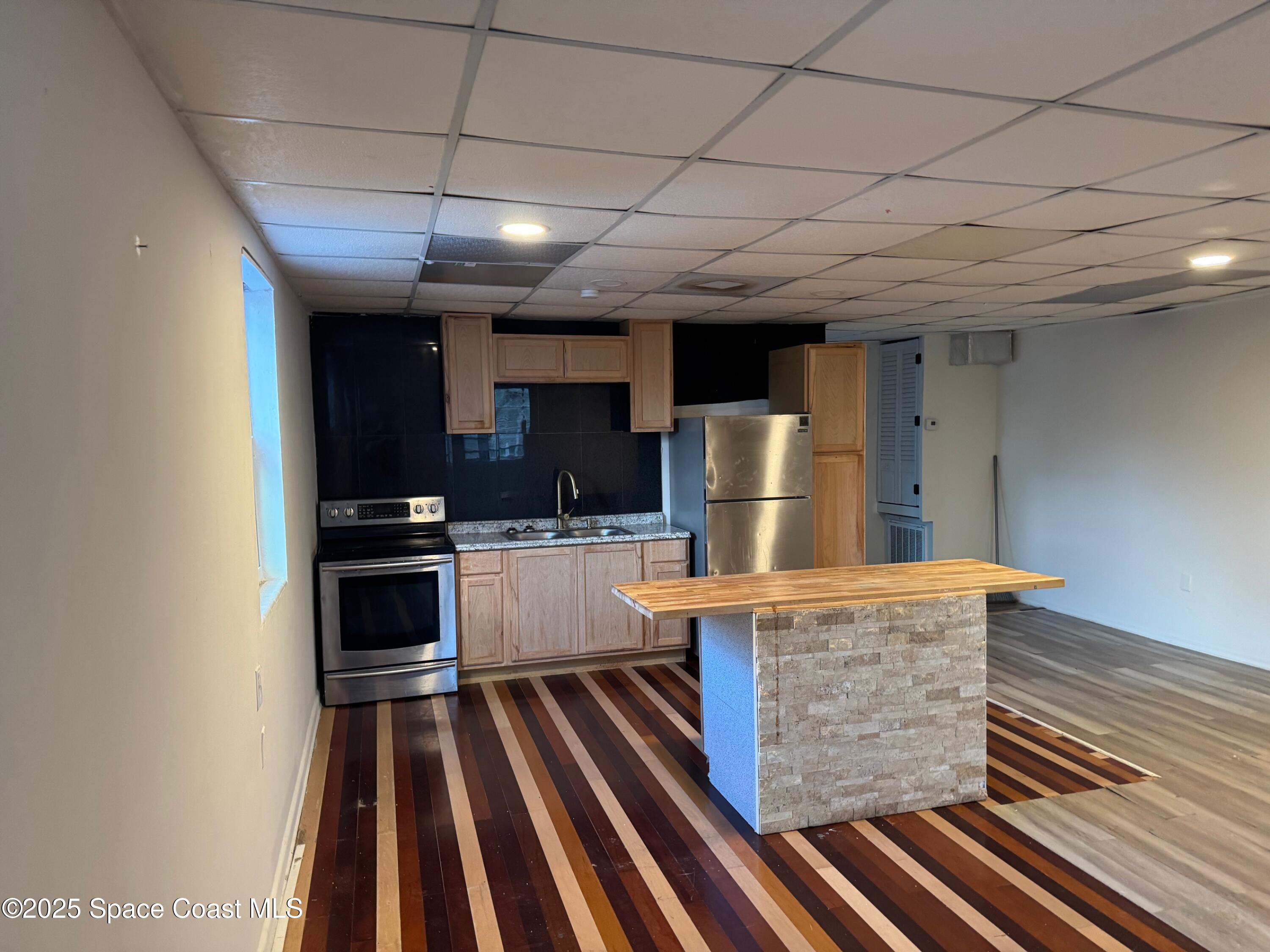 808 Forrest Avenue Cocoa, FL 32922 - Photo 5 of 11 a view of kitchen with cabinets