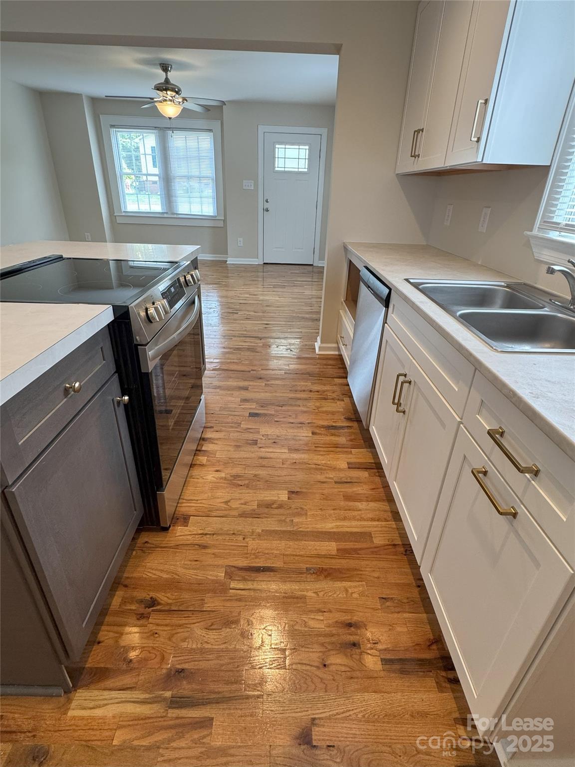 60 3rd Street Concord, NC 28025 - Photo 2 of 10 a view of a kitchen with storage and utility