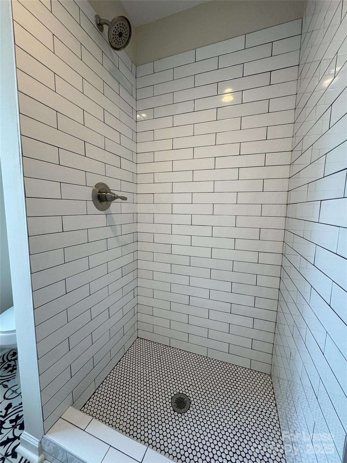 60 3rd Street Concord, NC 28025 - Photo 10 of 10 a bathroom with a shower