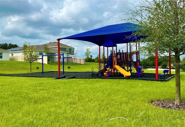 a view of a park with slide