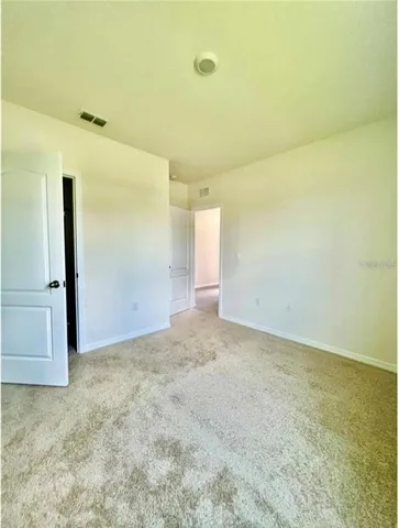 an empty room with a natural light