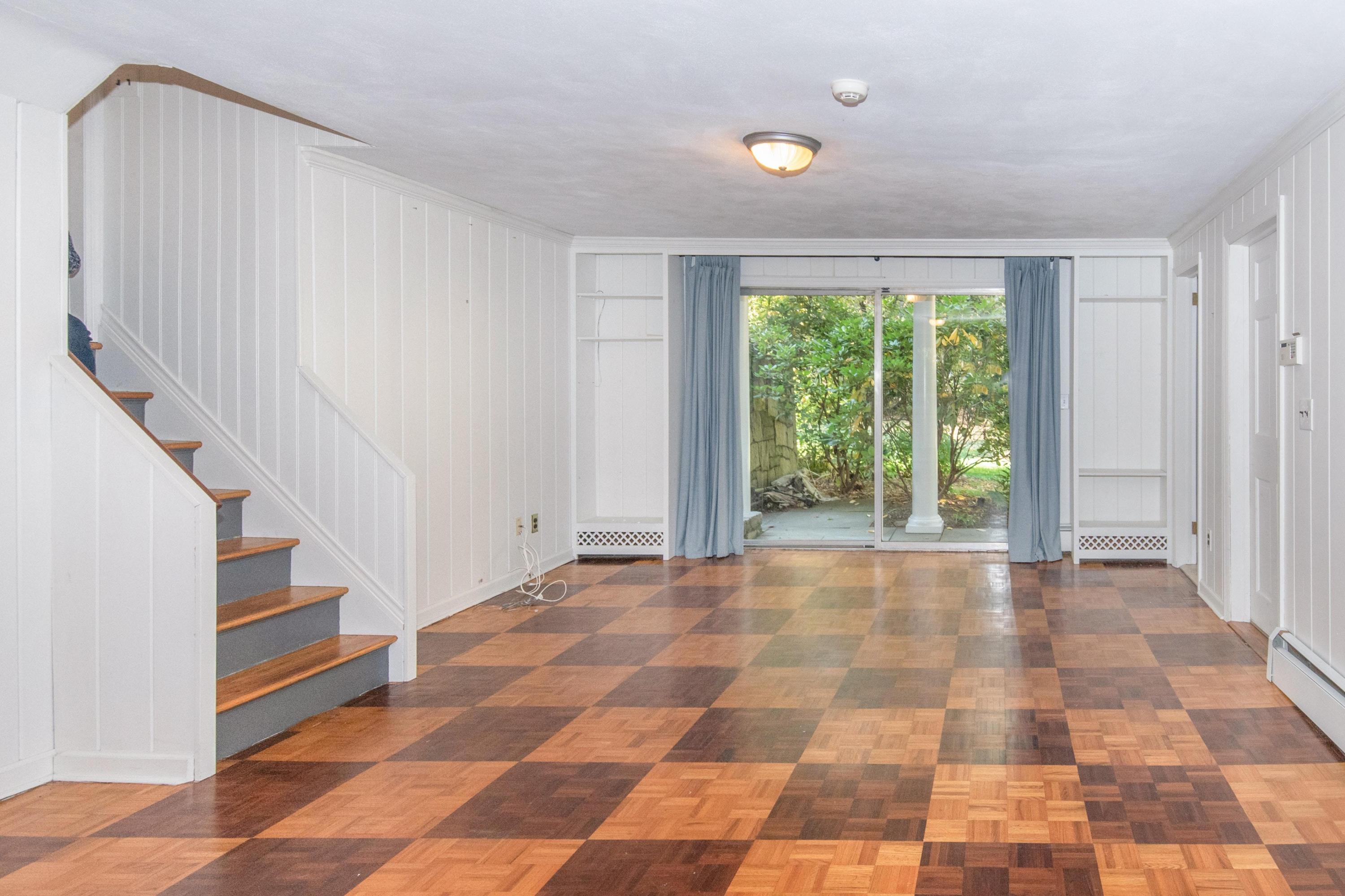 54 Huckleberry Hill Road New Canaan, CT 06840 - Photo 29 of 37 a view of an empty room with a window