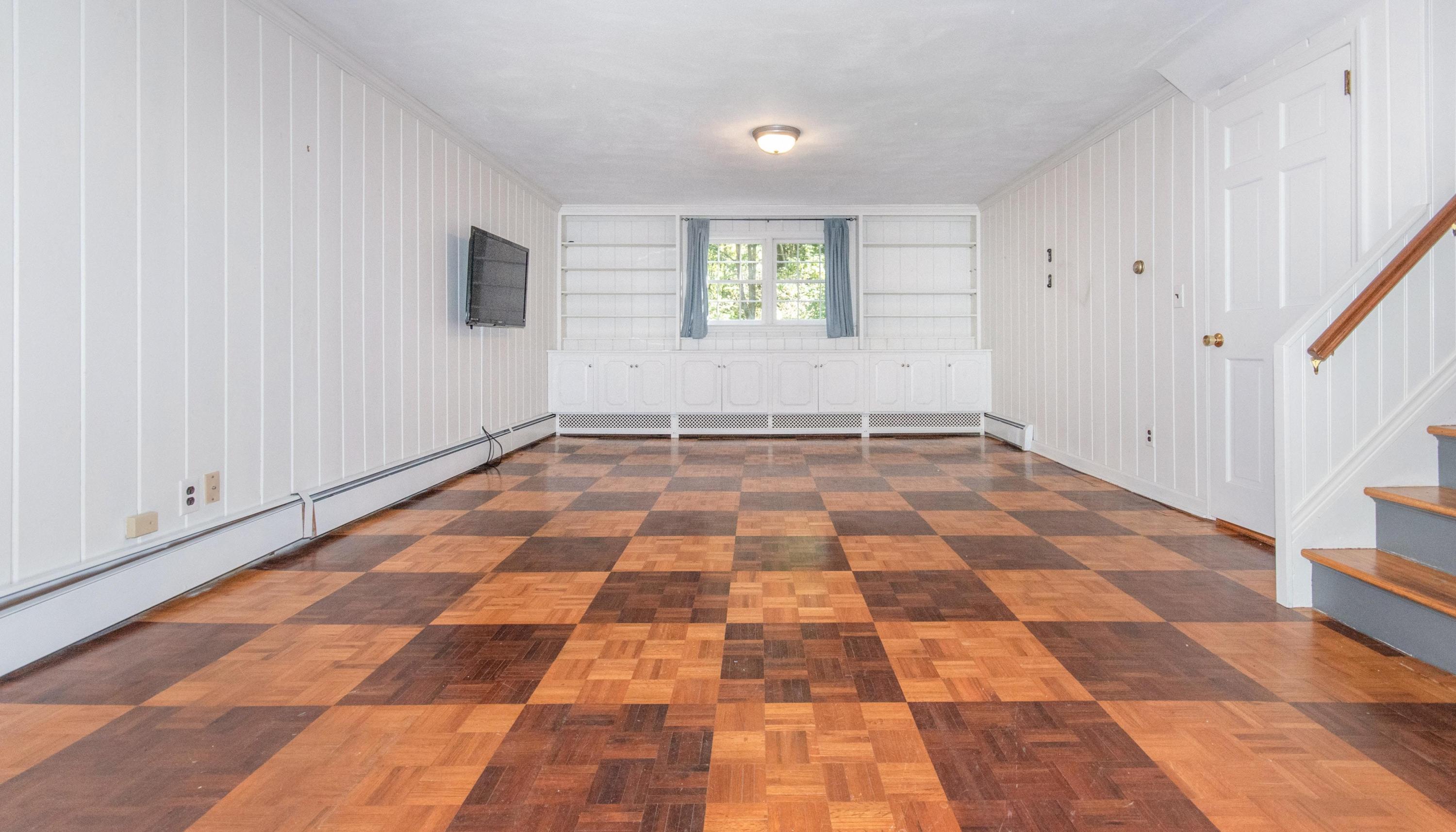 54 Huckleberry Hill Road New Canaan, CT 06840 - Photo 30 of 37 a view of an empty room with a window