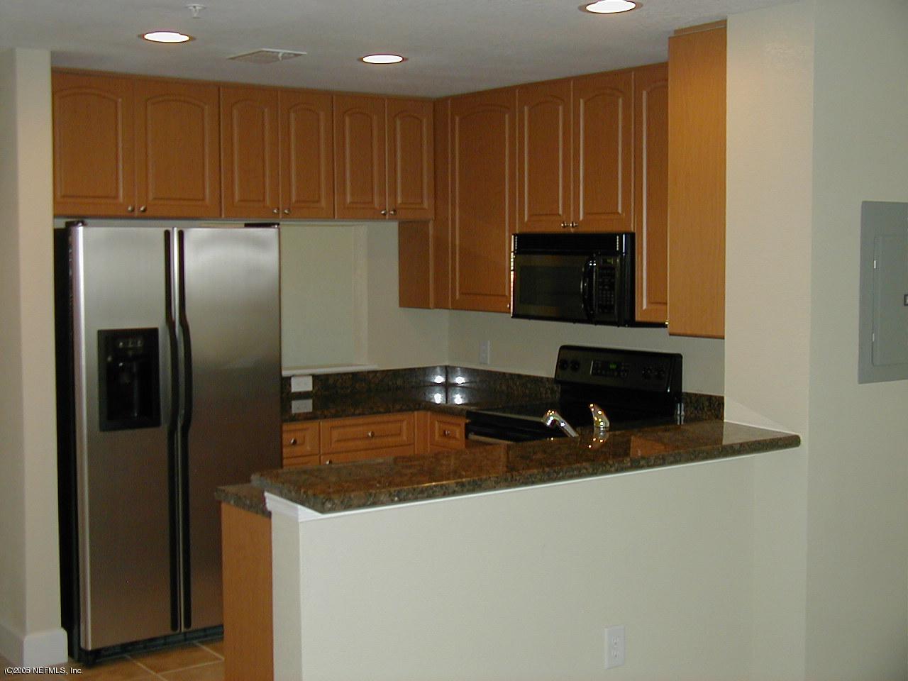 9745 Touchton Road, Unit 2424 Jacksonville, FL 32246 - Photo 6 of 7 Kitchen & Breakfast Bar