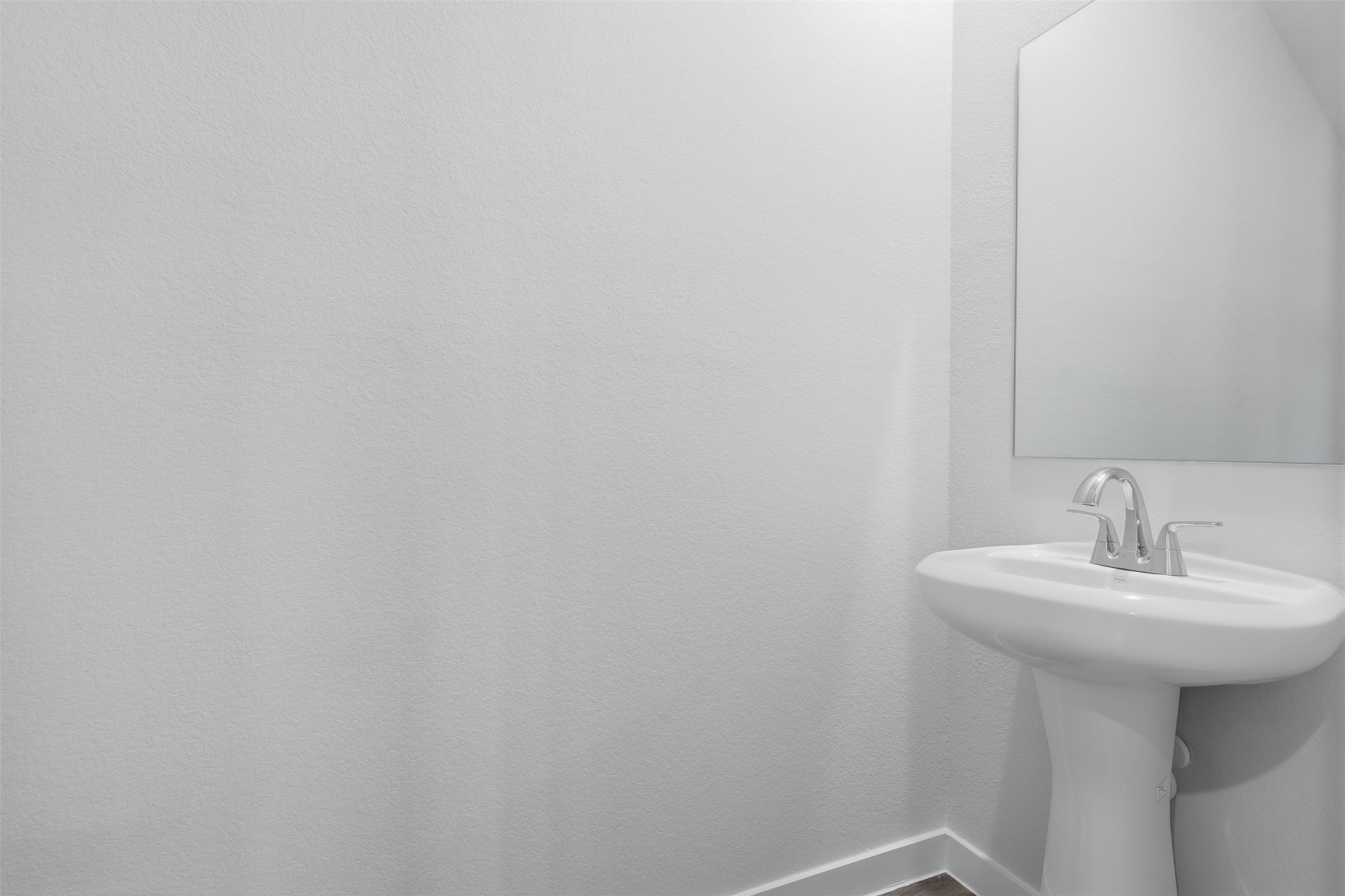 211 Brazen Forest Trail Magnolia, TX 77355 - Photo 5 of 14 a bathroom with a sink and mirror