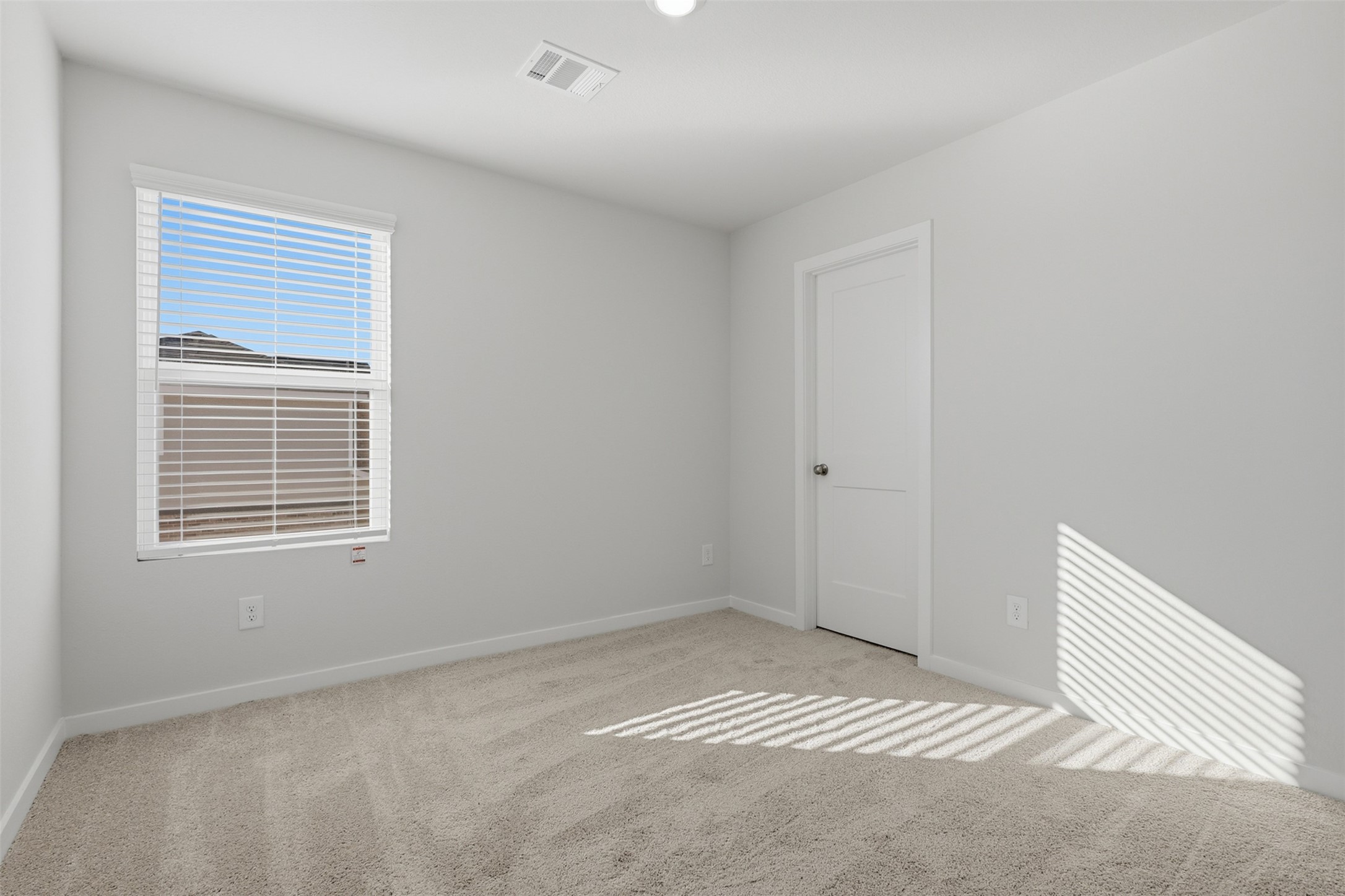211 Brazen Forest Trail Magnolia, TX 77355 - Photo 8 of 14 a view of an empty room with a window