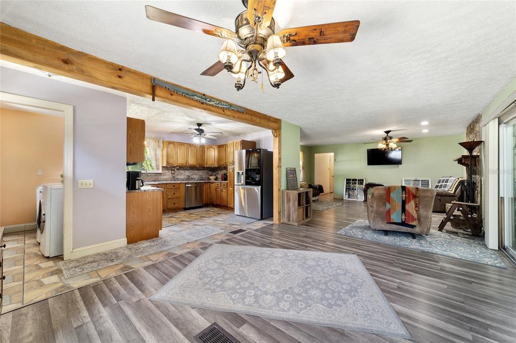 15755 Southwest 90th Avenue Dunnellon, FL 34432 - Photo 19 of 55 a view of a living room and kitchen