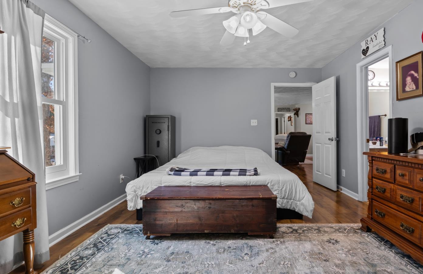 41 Golden Pond Circle Holladay, TN 38341 - Photo 20 of 42 a living room with a bed and a flat screen tv