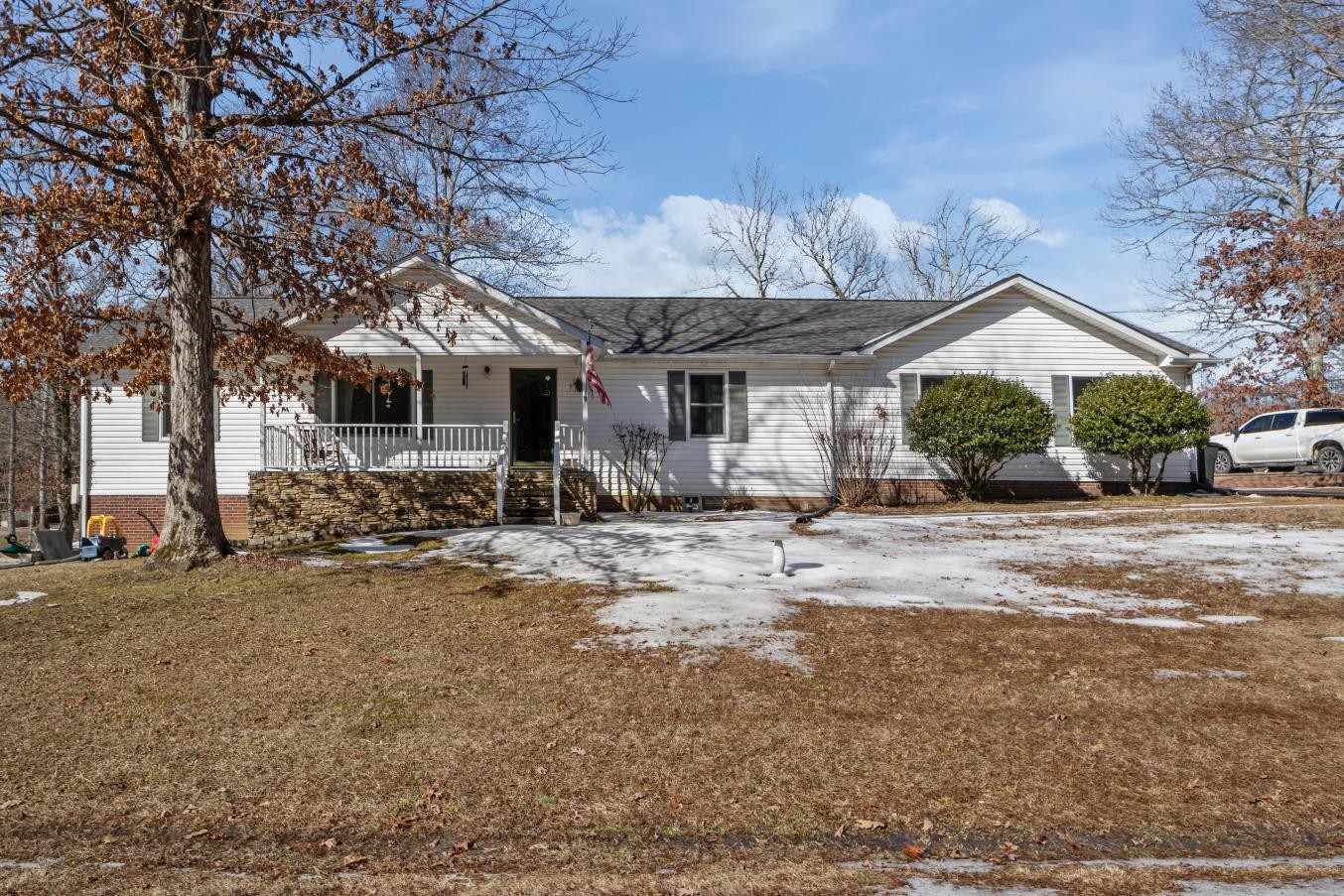41 Golden Pond Circle Holladay, TN 38341 - Photo 2 of 42 a front view of a house with a yard and garage