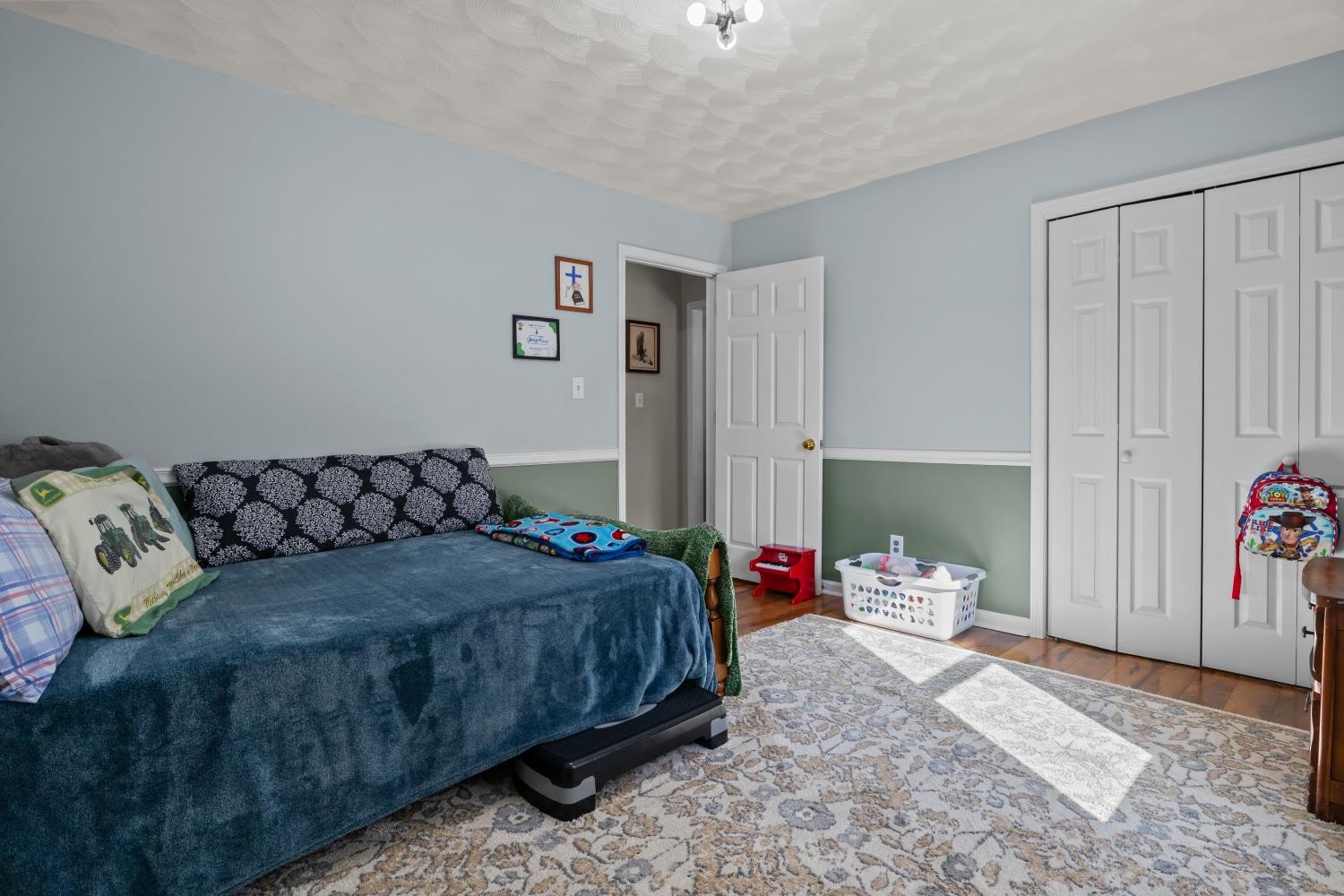 41 Golden Pond Circle Holladay, TN 38341 - Photo 25 of 42 a bedroom with a bed and a couch