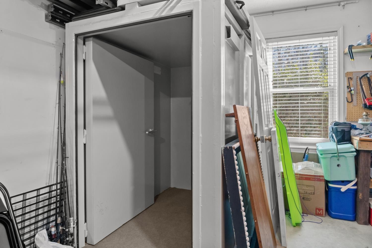 41 Golden Pond Circle Holladay, TN 38341 - Photo 31 of 42 a view of walk in closet with clothes and shoes