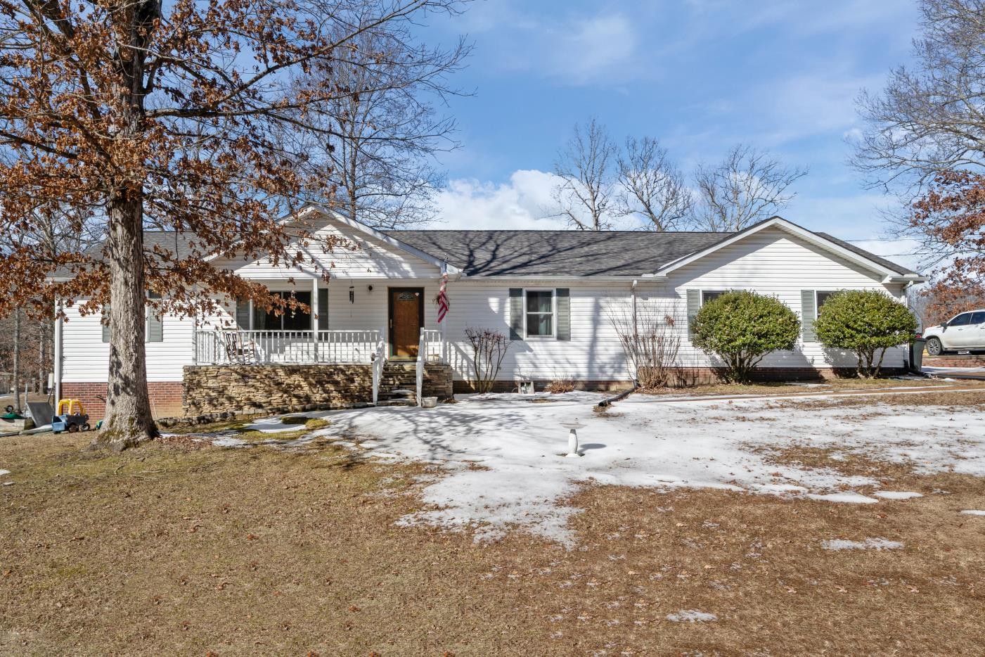 41 Golden Pond Circle Holladay, TN 38341 - Photo 39 of 42 a front view of a house with a yard