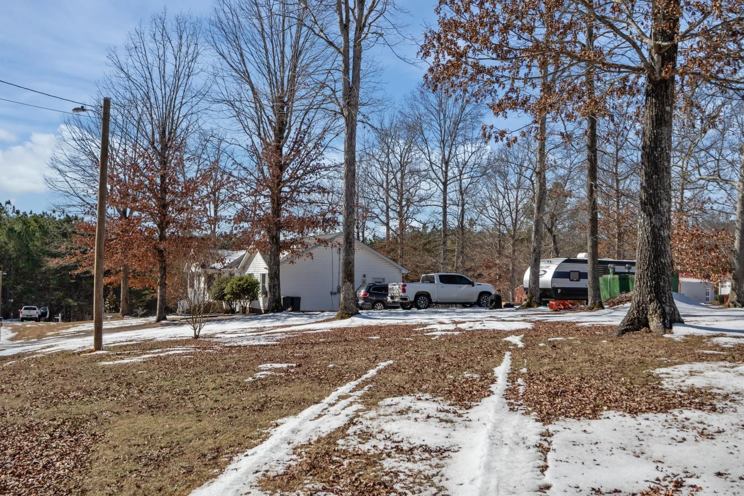 41 Golden Pond Circle Holladay, TN 38341 - Photo 42 of 42 a view of road with trees