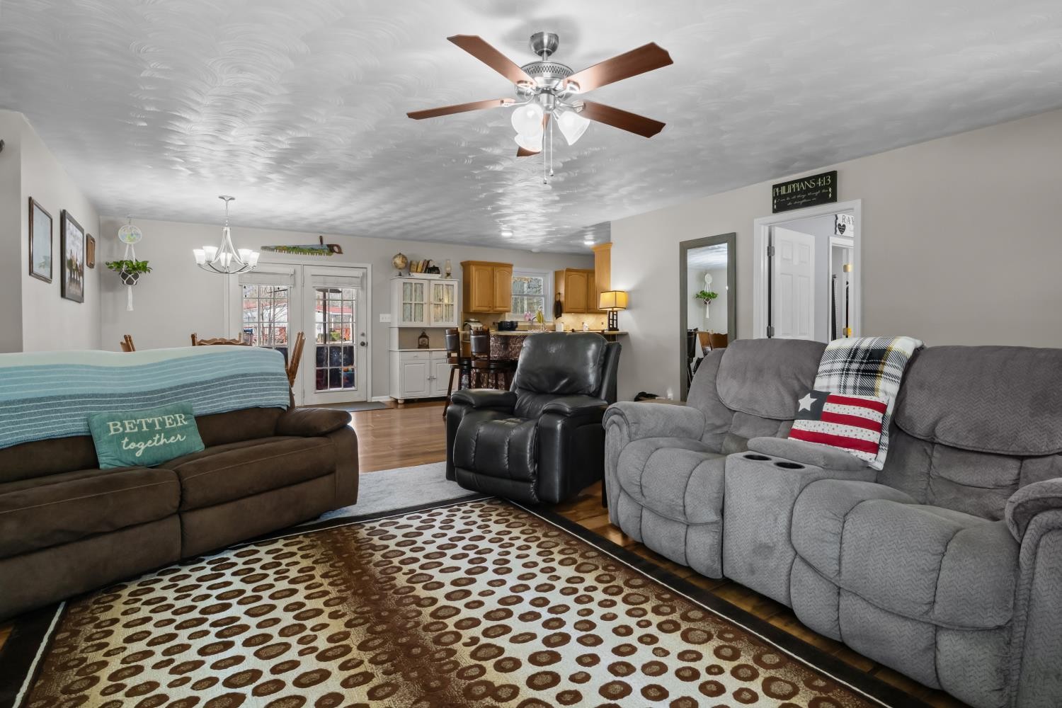 41 Golden Pond Circle Holladay, TN 38341 - Photo 7 of 42 a living room with furniture and a chandelier