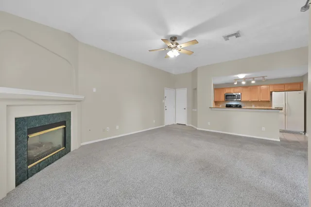 a view of an empty room and window