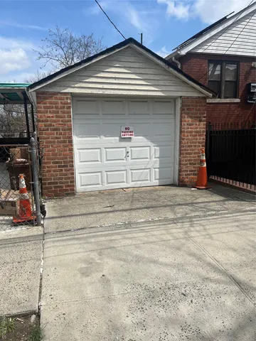 a front view of a house with a garage