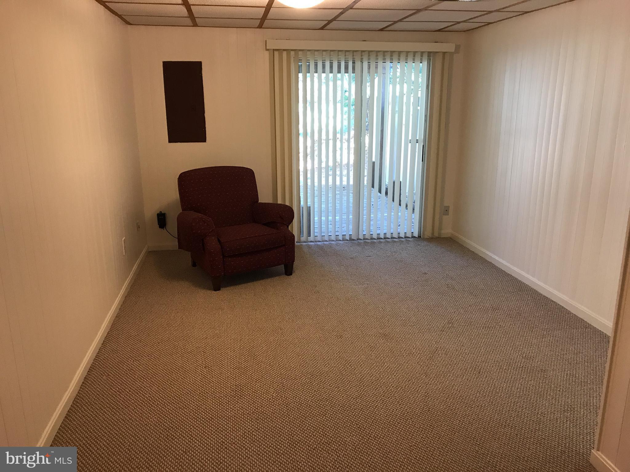 1717 Whisperhill Drive Reston, VA 20194 - Photo 10 of 10 a living room with furniture and a window