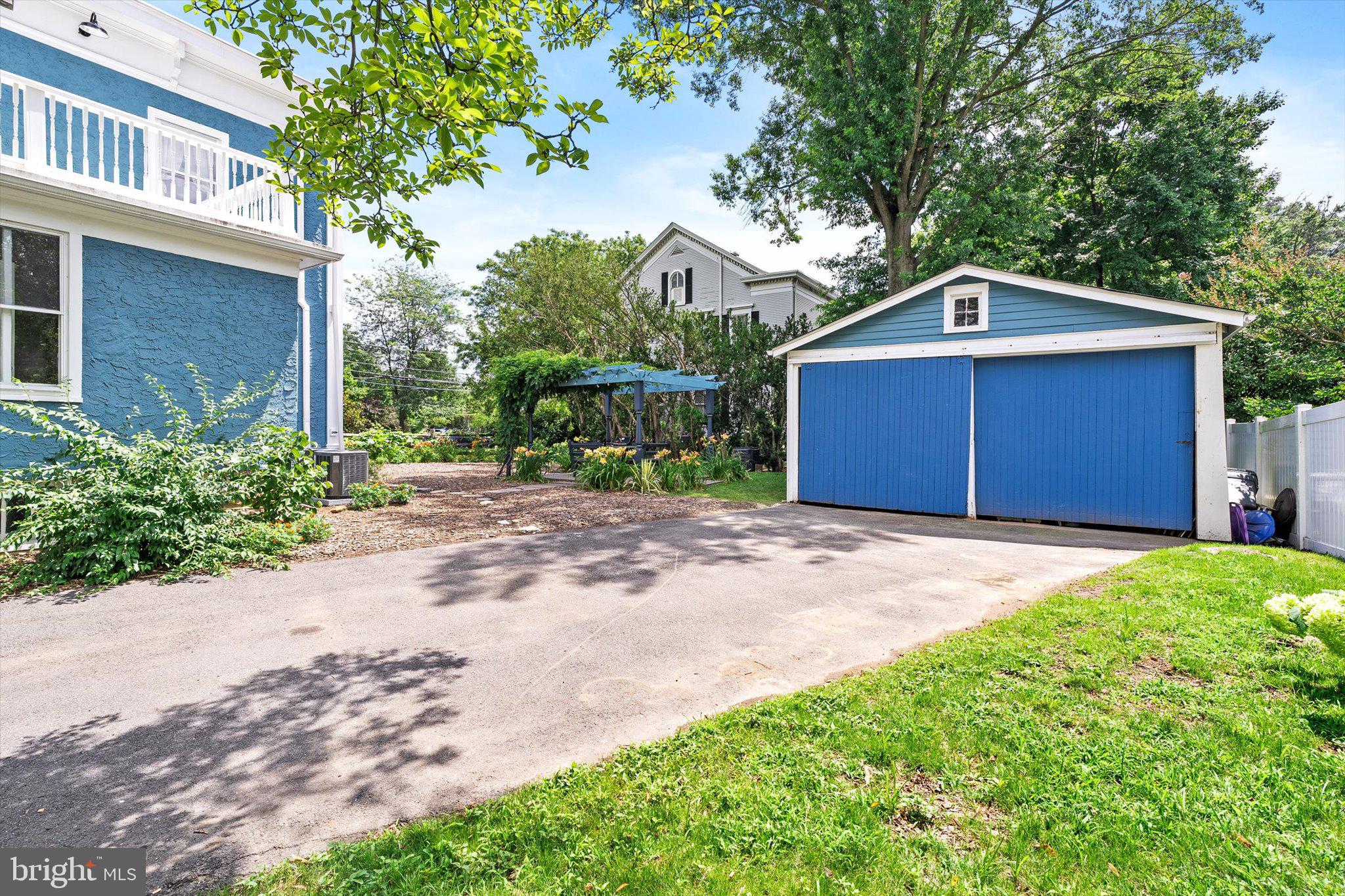302 South Main Street Hightstown, NJ 08520 - Photo 25 of 39 a front view of house with yard and trees around