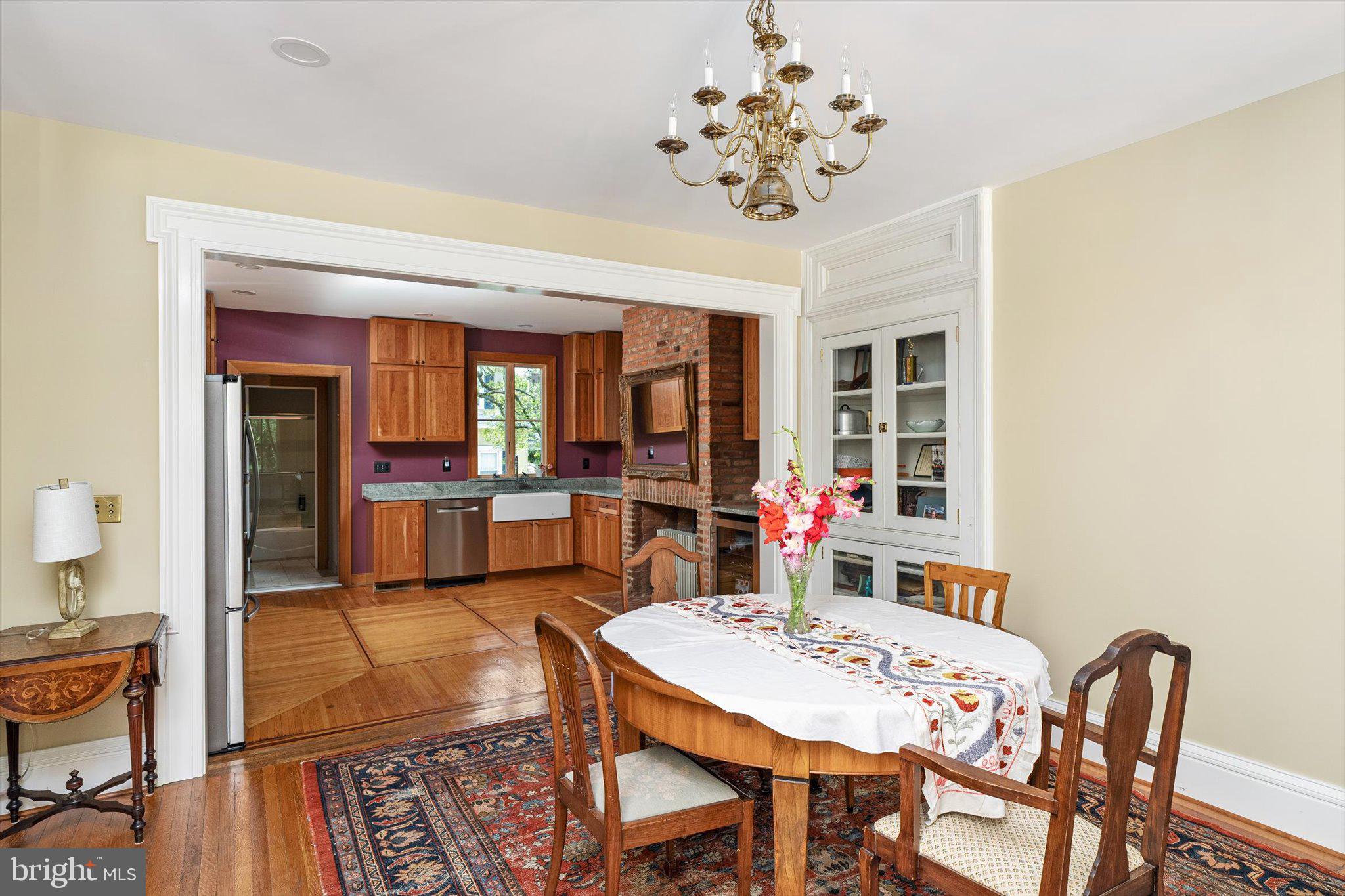 302 South Main Street Hightstown, NJ 08520 - Photo 10 of 39 a view of a dining room with furniture and a chandelier